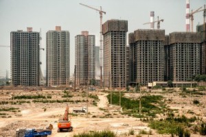 skyscrapers under construction in countryside