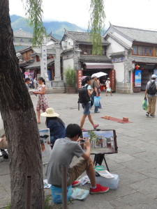A street painter painting Dali scenery
