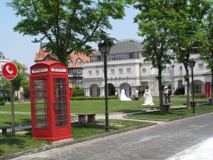 red British phone box and wedding photographs thames town