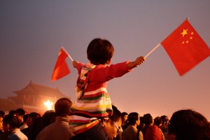 young child flag waving flag raising ceremony