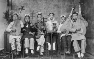 group of children in china play traditional instruments