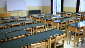 empty classroom with desks and chairs