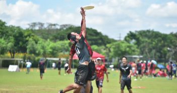 WFDF 2017 Asia Oceanic Ultimate and Guts Club Championships (AOUGCC) boy catching a frisbee during a game of ultimate frisbee