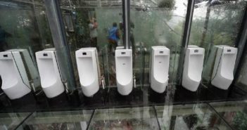 Loodicrous: Has China’s “Toilet Revolution” Gone Too Far? Glass bottom public bathroom at a scenic tourist spot in China