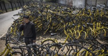 Does Ofo’s Punctured Fate Signal the Beginning of the End for the Sharing Economy in China? bike-sharing graveyard in China