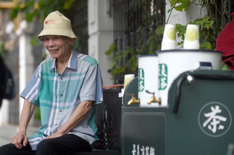 42-year-old Herbal Tea Stall Offers Free Drinks Over Summer