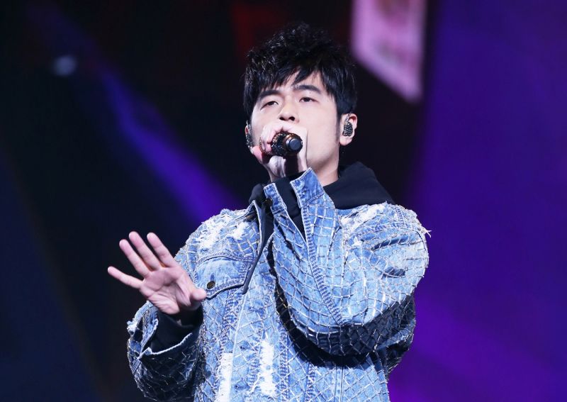 front view of jay chou singing on stage