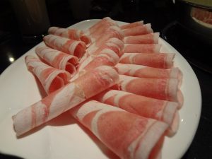Hotpot Chain Under Investigation for Serving Pork and Duck as Lamb Rolls