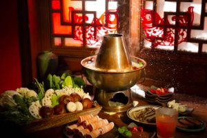 Couple Celebrate Wedding at Hotpot Restaurant
