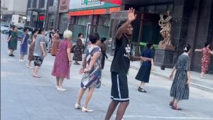 Basketball Players Join Square Dancers in Fuxin