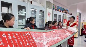 Students Recreate Famous Painting with Papercutting