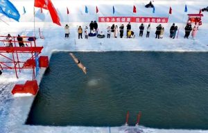 Swimmers Dive Into Harbin Icy Waters