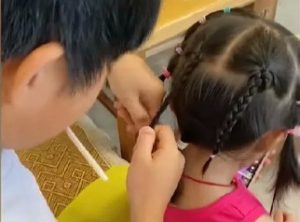Internet Impressed with Boy Braiding Sister's Hair Daily