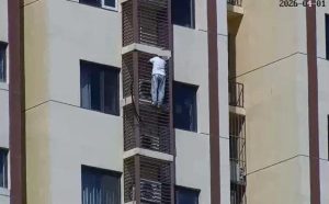 Elderly Woman Climbs Outside of Building to Escape Locked Door