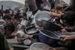 Volunteers Hand Out Free Meals After Mudslides at China-Nepal Border
